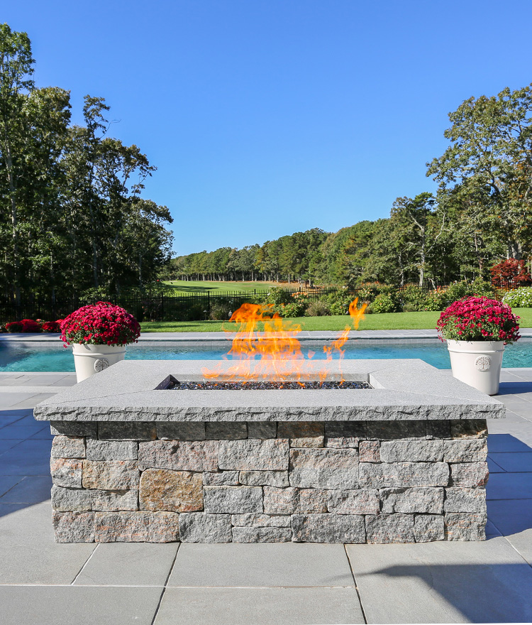Stone waterfall into pool