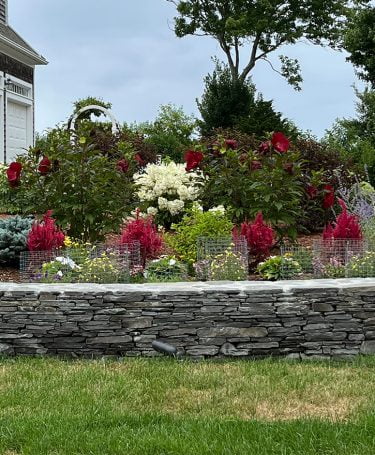 natural stone wall in front yard