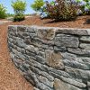 Natural stone retaining wall in garden
