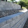 allan block retaining wall classic grey with beach pebbles