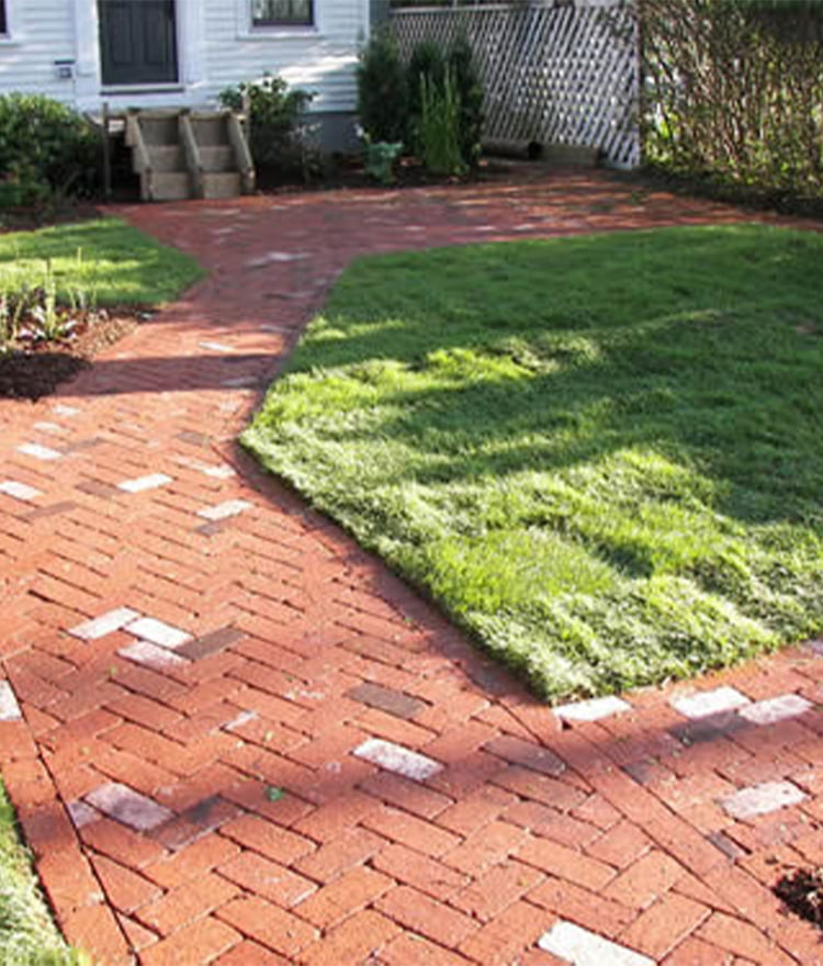 Coaldale Block street pavers line a walkway at Spring Hill College, Aug.  22, 2020, in Mobile, Alabama. The red clay bricks were made by Coaldale  Brick Stock Photo - Alamy