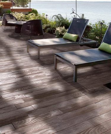 Borealis Smoked Pine concrete pavers poolside