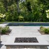 backyard landscaping pool and firepit stone pavers with garden
