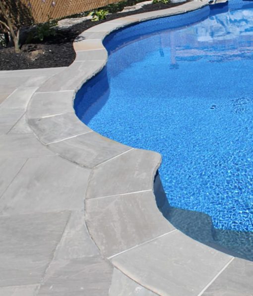 stone pavers around pool