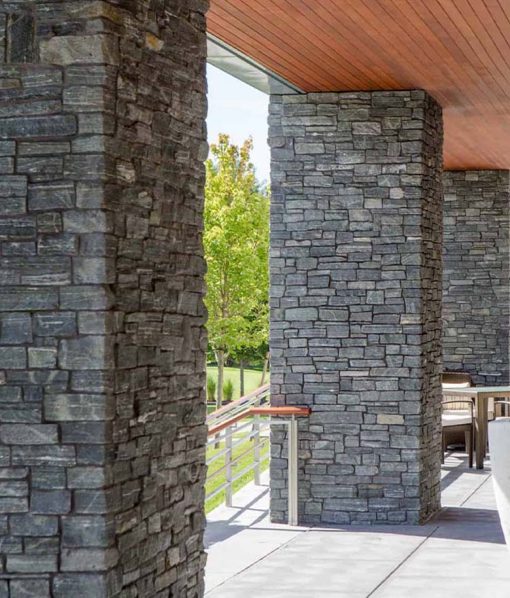 Pillars covered with thin stone veneer