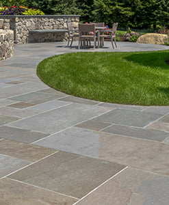 Natural Cleft Variegated Bluestone Porcelain Pavers - Patio Installation