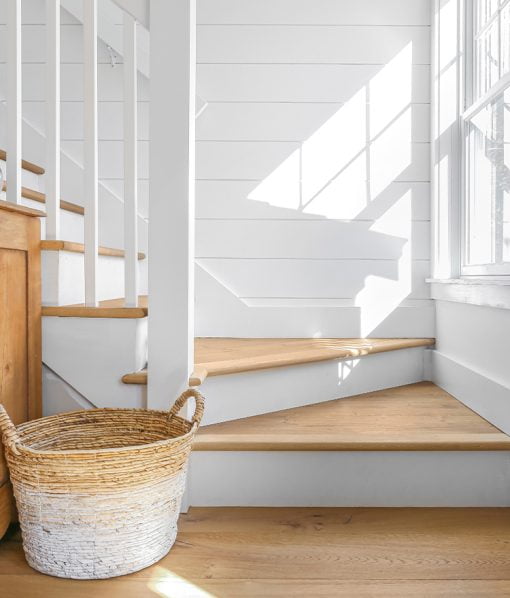 stairs with wood flooring
