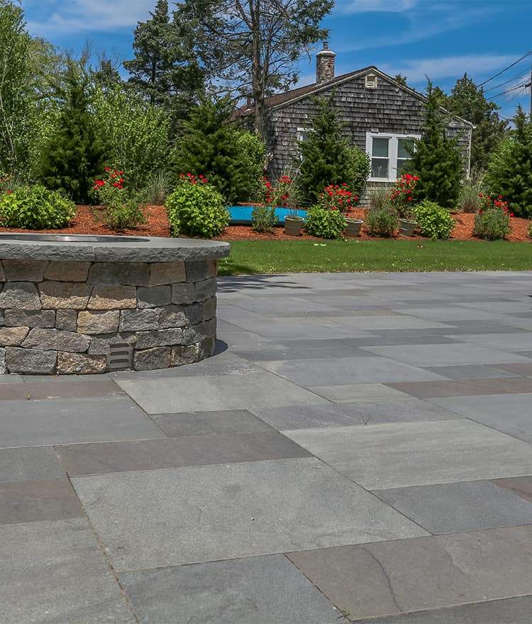 Everblue Thermal Blue pavers installed with Fire Pit