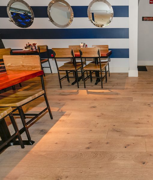 Nautical Design - Sawyer Mason Oak Bluffs Wide Plank Flooring installed at Mac's Seafood Chatham Fish & Lobster