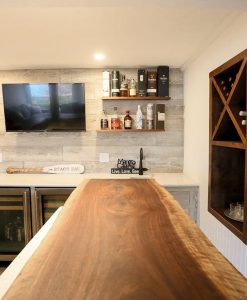 Basement Man Cave with Sawyer Mason Drift and Walnut Live Edge Slab Bar