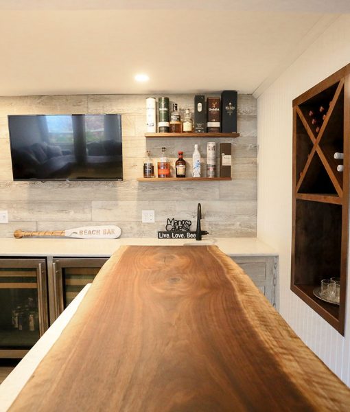 Basement Man Cave with Sawyer Mason Drift and Walnut Live Edge Slab Bar