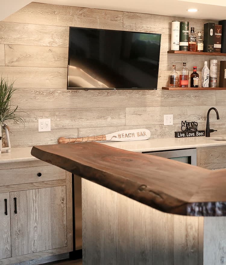 Basement Man Cave with Sawyer Mason Drift and Walnut Live Edge Slab Bar