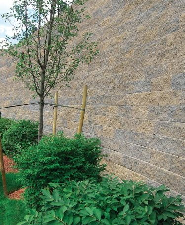 tan and gray large block retaining wall blend