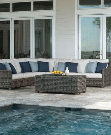 sectional loveseat by the pool