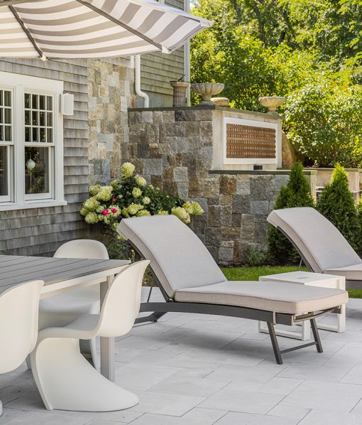 Patio with natural stone retaining wall