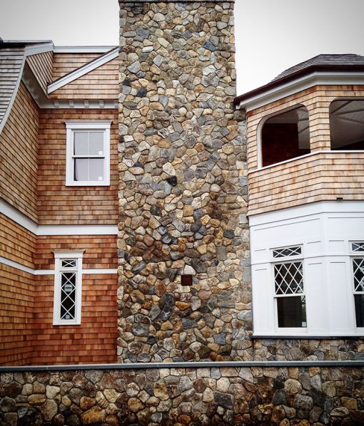 Chimney covered in natural stone