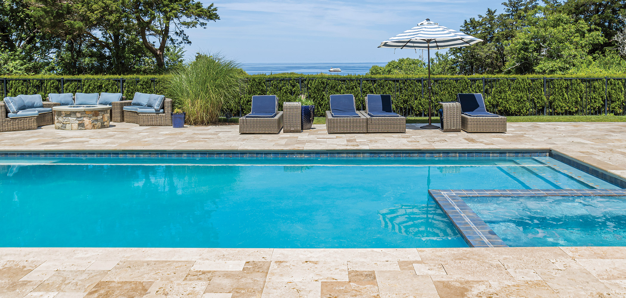travertine stone pavers on a pool with view