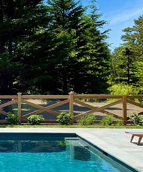 cedar fence around a pool side
