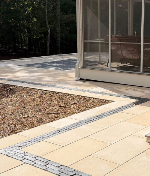 light brown rustic stone pavers patio shown