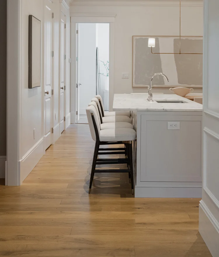 luxury back bay kitchen with brown toned natural wood floor