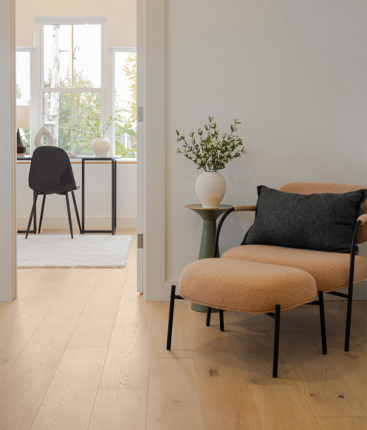 Chairs in windowside office with light brown flooring