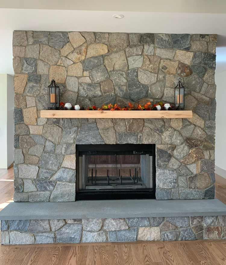 Natural stone mosaic thin stone veneer indoor fireplace with a mantel
