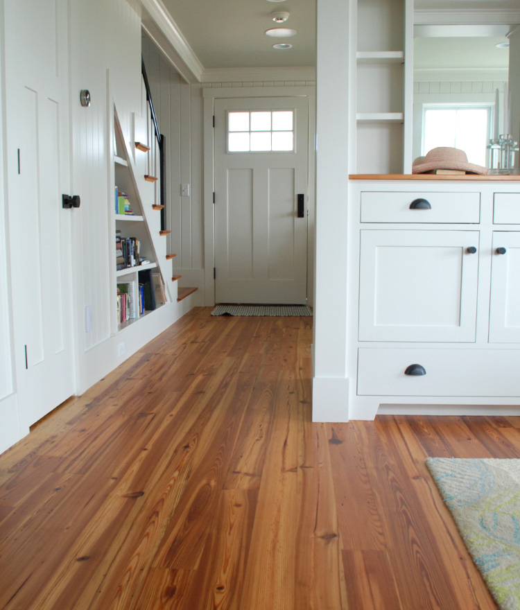 Front entryway of home with antique heart pine flooring